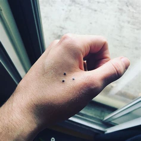 meaning 3 dots tattoo